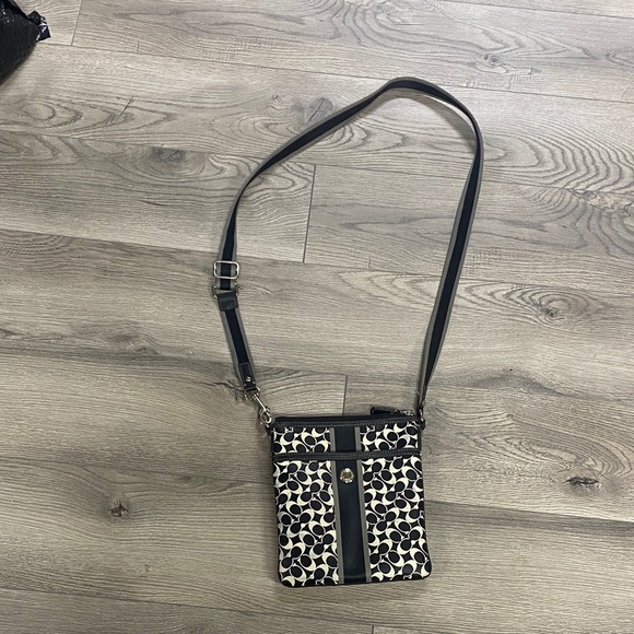 Coach Handbags - Stylish Black and Cream Crossbody Bag